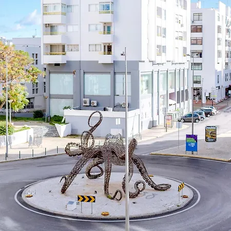 Al - Avenida